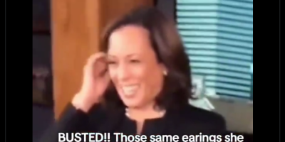 Kamala Harris with in-ear monitor